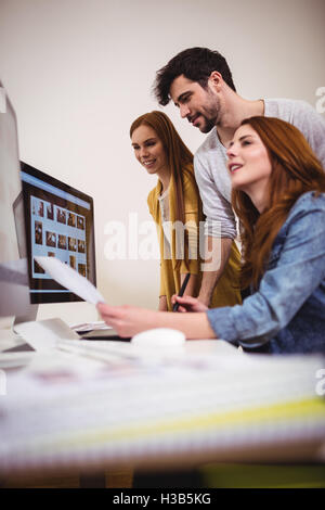 Stylish photo editors working on computers Stock Photo