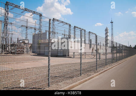 High-voltage station metal fence in perspective Stock Photo