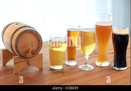 close up of different beers in glasses on table Stock Photo