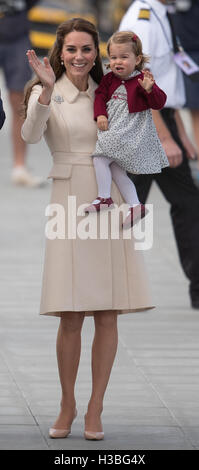 Catherine, Duchess of Cambridge, holds her daughter Princess Charlotte in Victoria Harbour, Canada. Stock Photo