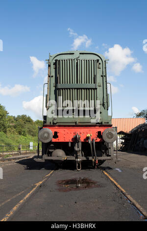 Front of Diesel train in a shunting yard. Detail showing the front buffers and engine grill Stock Photo