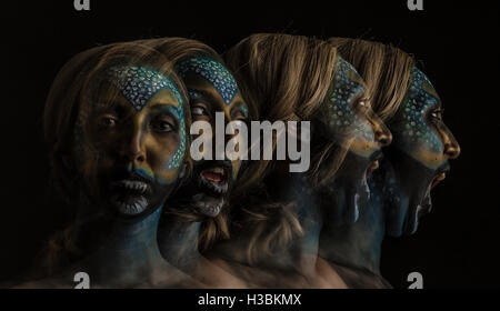 Female alien horror creature, special effects creative make up lighting portrait, multiple exposure Stock Photo