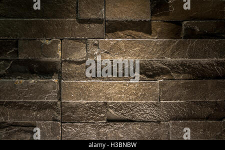 Modern brick wall - Pattern of black slate wall texture and background Stock Photo