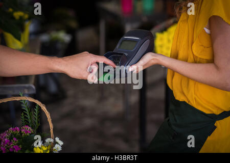 Man making payment with his credit card Stock Photo