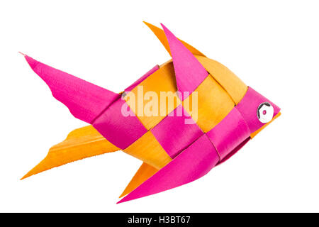 Vivid pink and yellow hand woven bamboo fish with silver eye. close up, isolated on white. Stock Photo