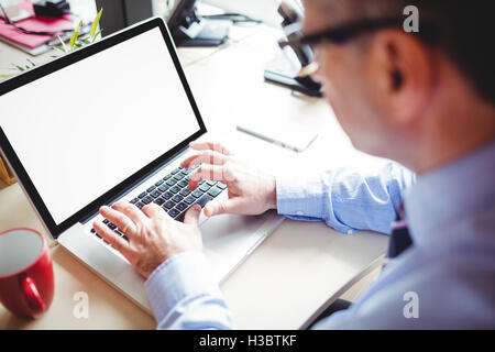 Businessman working on laptop Stock Photo