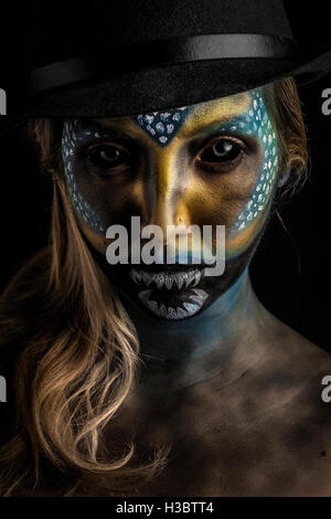 Female alien horror creature, special effects creative make up lighting portrait Stock Photo