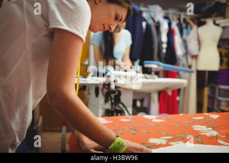 Female fashion designers working in the studio Stock Photo