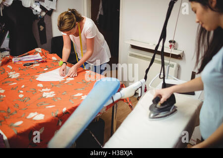 Female fashion designers working in the studio Stock Photo