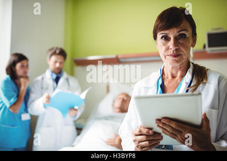 Female doctor using digital tablet Stock Photo
