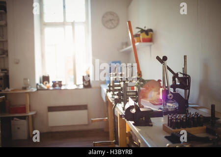 Goldsmith work tools on workbench Stock Photo