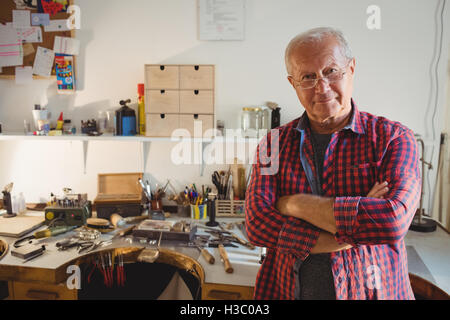 Portrait of goldsmith in workshop