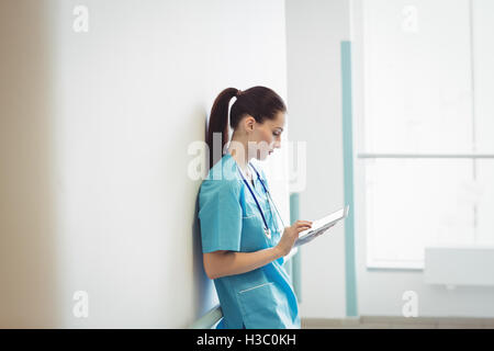 Nurse using digital tablet Stock Photo