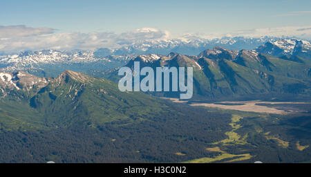 Aerial view of the Redoubt Volcano, shrouded in the clouds. Lake Clark National Park, Alaska. Stock Photo