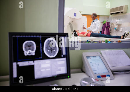 Digital brain scan on computer monitor Stock Photo