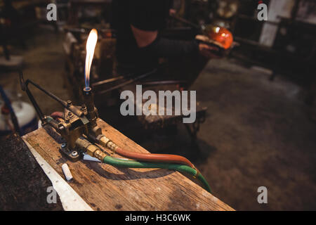 Empty workstation with glassblowing torch Stock Photo