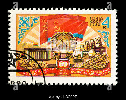 Postage stamp from the Soviet Union depicting buildings from the Kazakhstan Republic, 60'th anniversary. Stock Photo