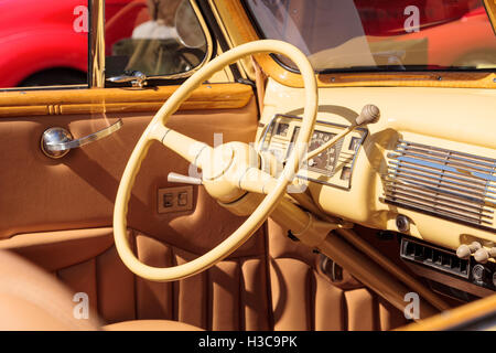 Laguna Beach, CA, USA - October 2, 2016: Yellow 1940 Ford Deluxe Convertible owned by Larry Davis and displayed at the Rotary Cl Stock Photo