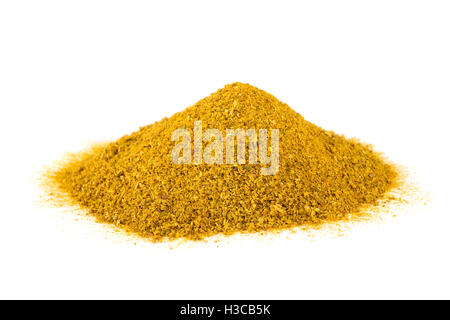 curry spice heap isolated on white background Stock Photo