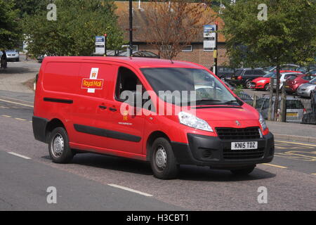 A SUNNY OFFSIDE VIEW OF A ROYAL MAIL PEUGEOT DELIVERY VAN Stock Photo