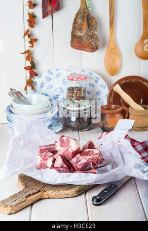 Raw and fresh oxtail on the table of the kitchen ready to be cooked Stock Photo