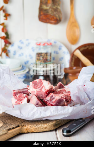 Raw and fresh oxtail on the table of the kitchen ready to be cooked Stock Photo