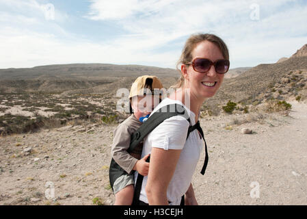 Mother and young son hiking in Big Bend National Park, Texas, USA Stock Photo