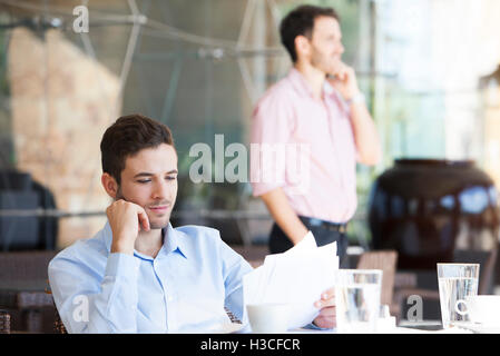 Businessman reviewing contract Stock Photo