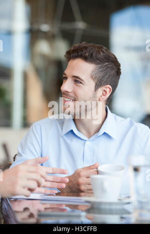 Businessmen taking coffee break Stock Photo
