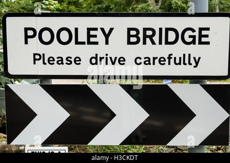 Road sign warning motorists on entry into POOLEY BRIDGE in the English Lake District Stock Photo