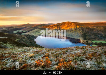 Ireland, Wicklow Mountains Sunrise Lough Tay Lake Stock Photo