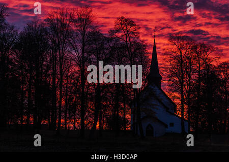 Little church in Norwegian town with the sunset view Stock Photo