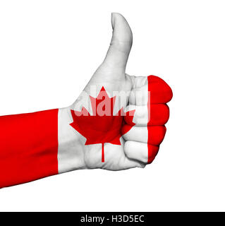 Hand with thumb up painted in colors of Canada flag isolated Stock Photo