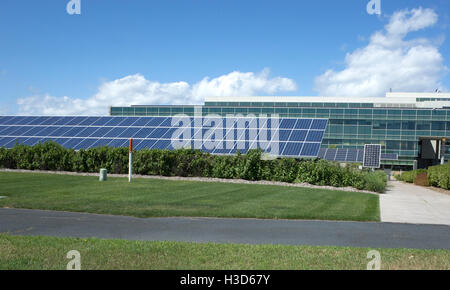 Large array of solar panels supplying electricity to the Great River Energy Cooperative facility. Maple Grove Minnesota MN USA Stock Photo