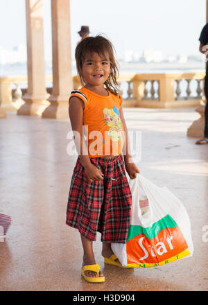 Street child on Sisowath Quay in Phnom Penh,Cambodia. Stock Photo