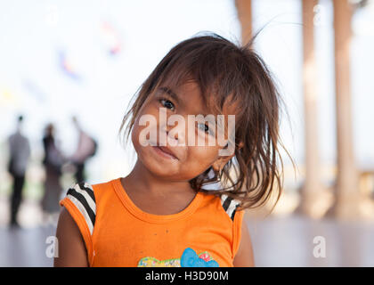 Street child on Sisowath Quay in Phnom Penh,Cambodia. Stock Photo