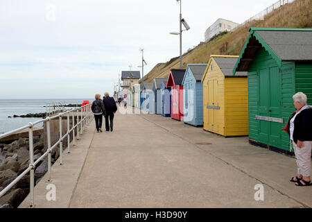 Sheringham, Norfolk, UK. September 24, 2016.  Colorful beach huts line the promenade at Sheringham in Norfolk. Stock Photo