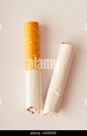 cigarette broken in half Stock Photo