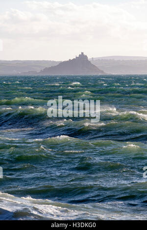 Penzance, Cornwall, UK. 6th October 2016. Large waves from strong winds create pass St Michael's Mount. Pic by Mike Newman/Alamy Live News Stock Photo