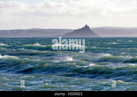 Penzance, Cornwall, UK. 6th October 2016. Large waves from strong winds create pass St Michael's Mount. Pic by Mike Newman/Alamy Live News Stock Photo