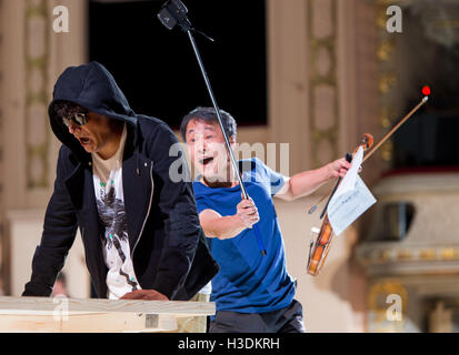 Berlin, Germany. 5th Oct, 2016. Tansel Akzeybek (l) as Il Conte d'Almaviva on stage during a photo call for a new production of The Barber of Seville by Gioacchino Rossini at the Komische Oper Berlin in Berlin, Germany, 5 October 2016. The production premieres on 9 October 2016. PHOTO: MONIKA SKOLIMOWSKA/DPA/Alamy Live News Stock Photo