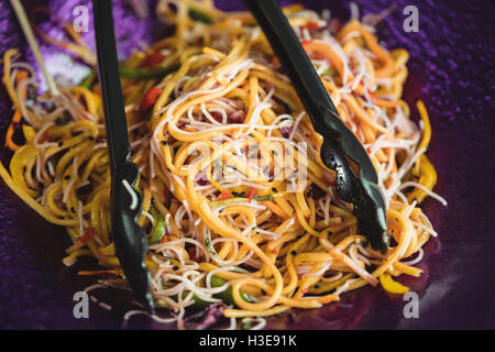 Close-up of cooked spaghetti on plate Stock Photo