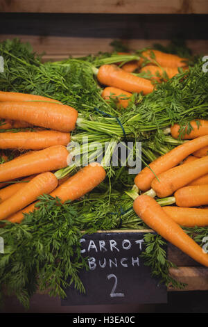 Fresh carrots in supermarket Stock Photo