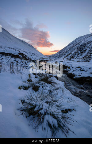 The Moffat Water Valley in winter at dusk, near Moffat, Dumfries & Galloway, Scotland. Stock Photo