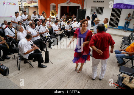 Older couple dancing at a community street festival in Acapulco, Mexico. Stock Photo
