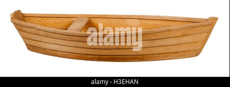 Wooden boat with a bench in the middle of the boat - path included Stock Photo
