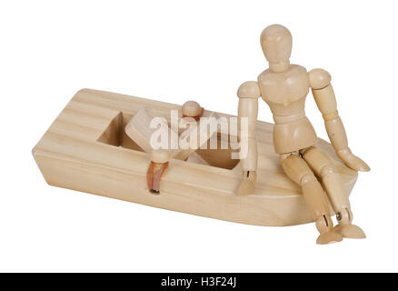 Relaxing on a Rubber band powered wooden paddle boat - path included Stock Photo