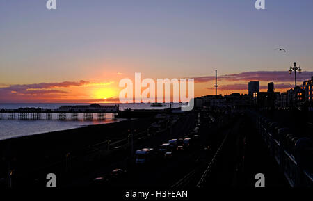 Sunset over Brighton seafront UK Stock Photo