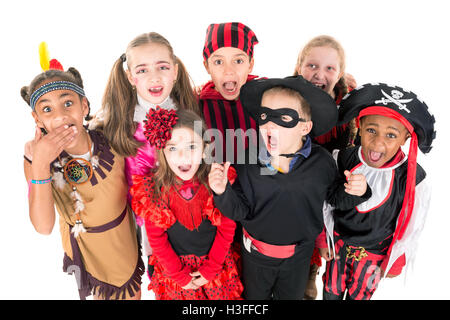 Group of kids in Halloween costumes isolated in white Stock Photo