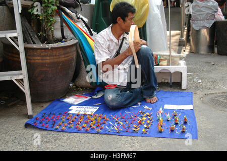 Straw folding craftsman Bangkok Stock Photo